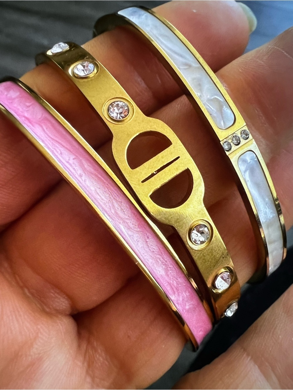 Gold Tone Bangle Bracelet Trio with Pink and White Inlay